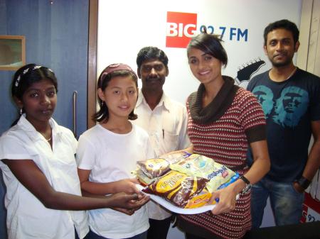 Actress Biyanka handsover biscuits & chocolates to children of Asha Nilaya Orphanage